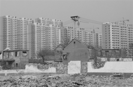 城鎮(zhèn)化成地方兩會熱議話題農民住樓更需融入城市